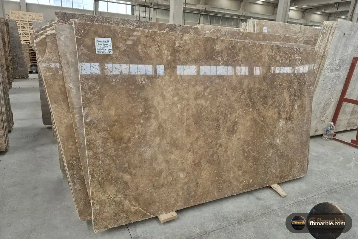 Walnut Travertine slab from FB Marble Lahore, suited to contrasting stone islands