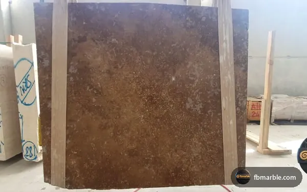 Walnut Travertine slab from FB Marble Lahore, suited to countertop being refinished