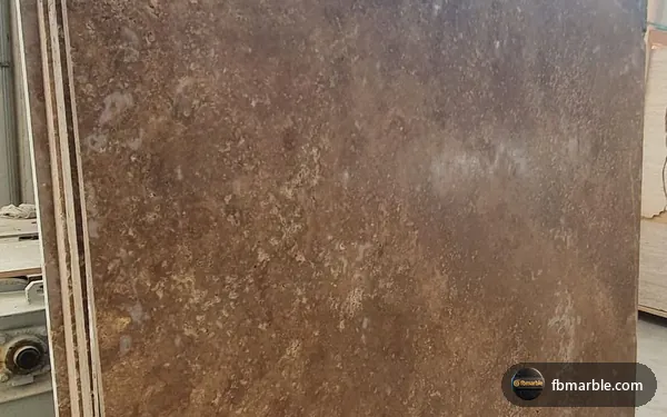 Dark Travertine slab from FB Marble Lahore, suited to light vs dark countertop comparison
