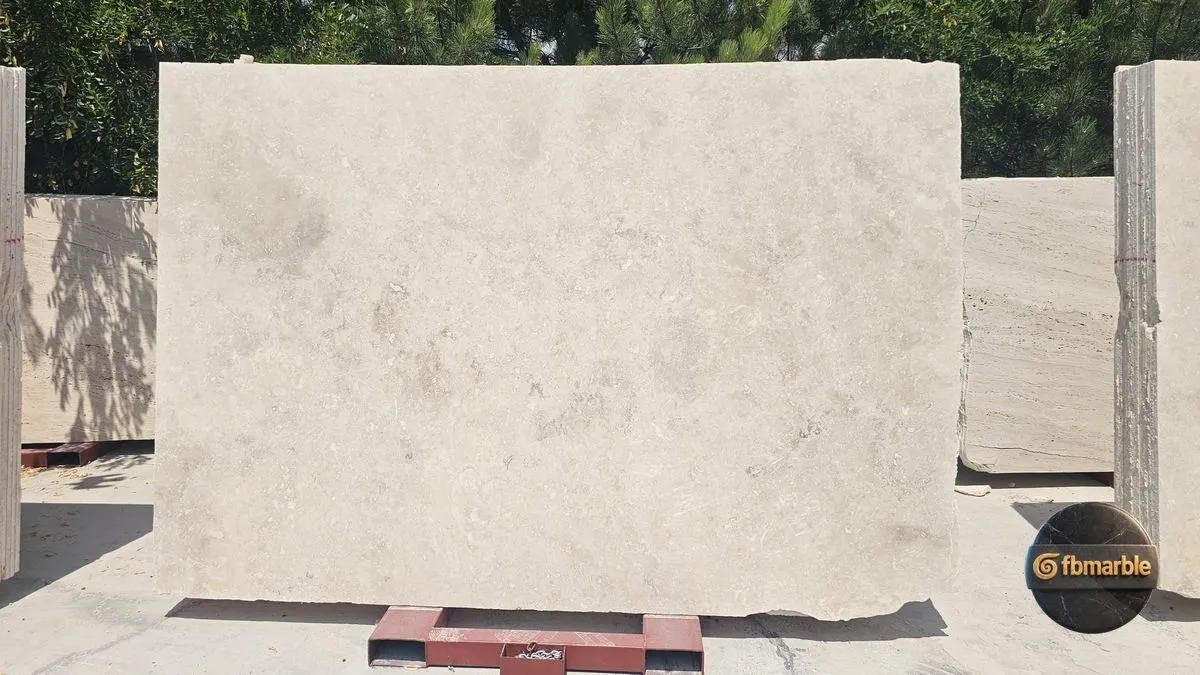 White Travertine photo 2 – chalky off-white cross-cut travertine